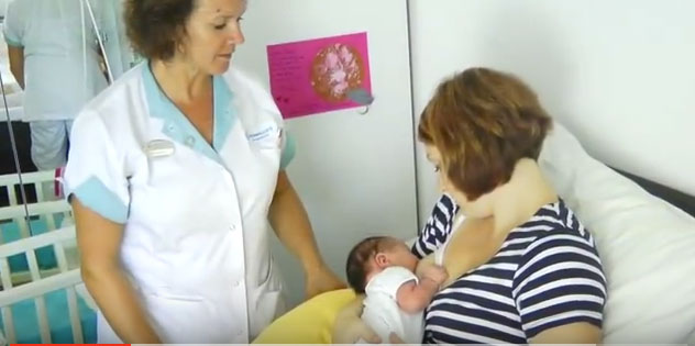 Dutch maternity nurses help new mothers with breastfeeding.