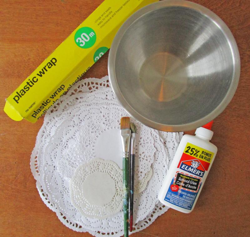 What you need to make a paper doily bowl.